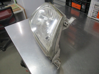 Toyota Hilux Genuine Drivers Headlight Lens Used