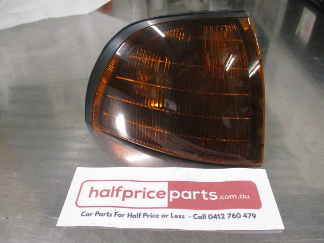 Mitsubishi Magna/Verada Genuine Right Hand Front Indicator Assembly (Tinted Amber) New Part