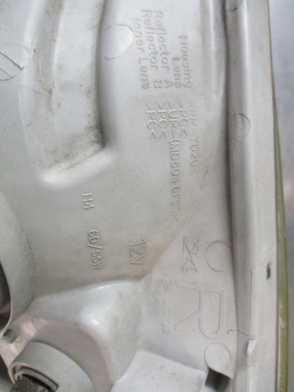 Toyota Hilux Genuine Drivers Headlight Lens Used