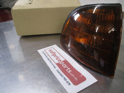 Mitsubishi Magna/Verada Genuine Right Hand Front Indicator Assembly (Tinted Amber) New Part