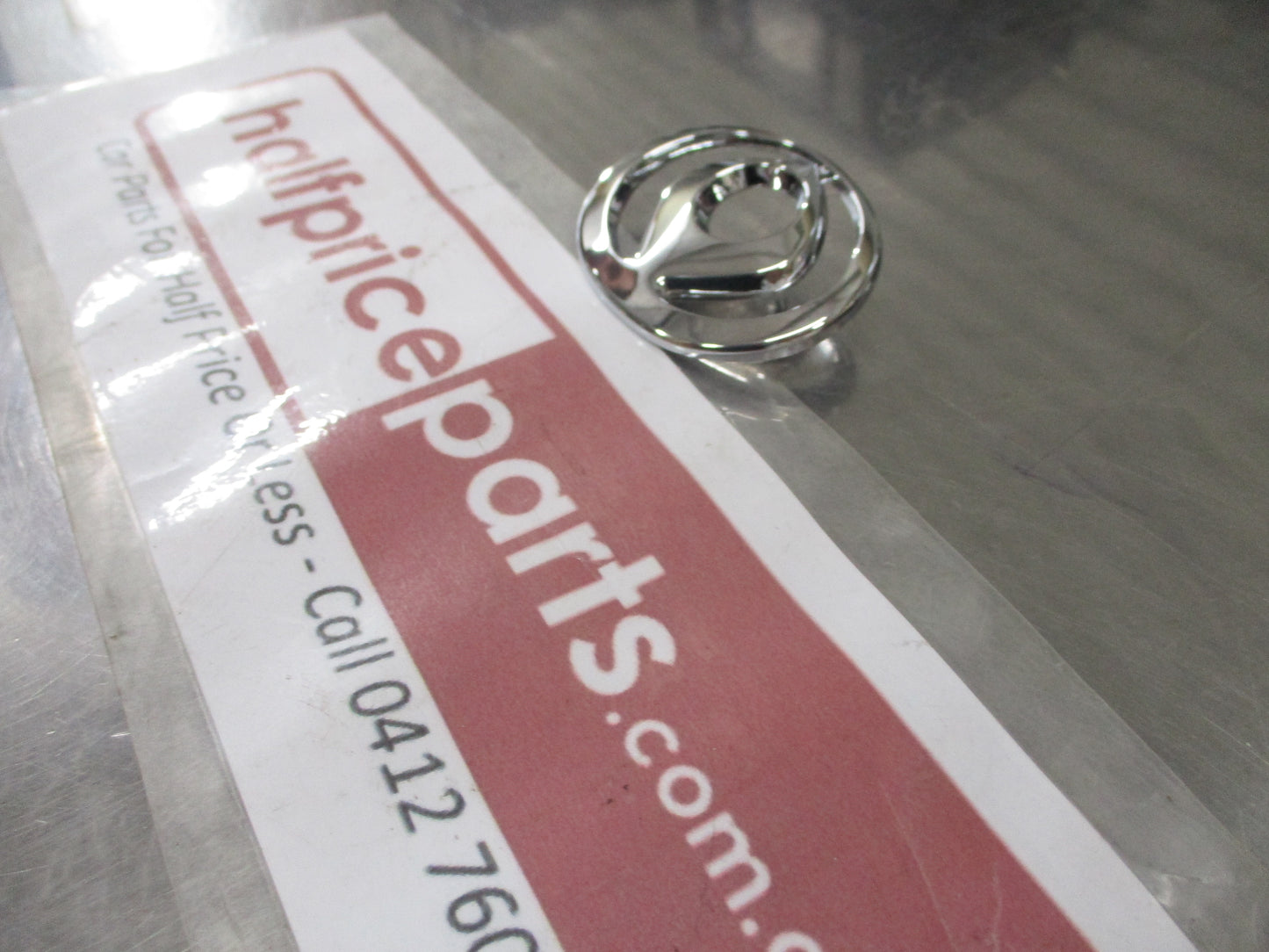 Mazda Portage Genuine Front Grille Emblem New Part