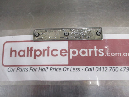 Mazda 121 Genuine Chrome Rear Boot Lid Emblem New Part