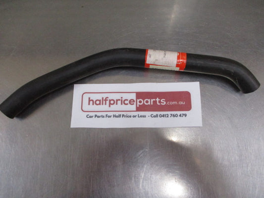 Mitsubishi Magna Genuine Lower Water Pump To Manifold Hose New Part