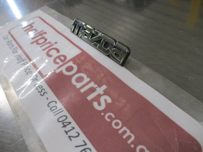 Mazda Protege Genuine Rear Emblem Badge (Chrome And Black) New Part