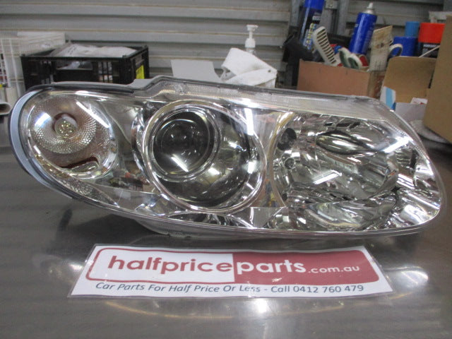 Holden VT Statesman / Caprice Genuine Drivers Side Head Light Assembly New Part.
