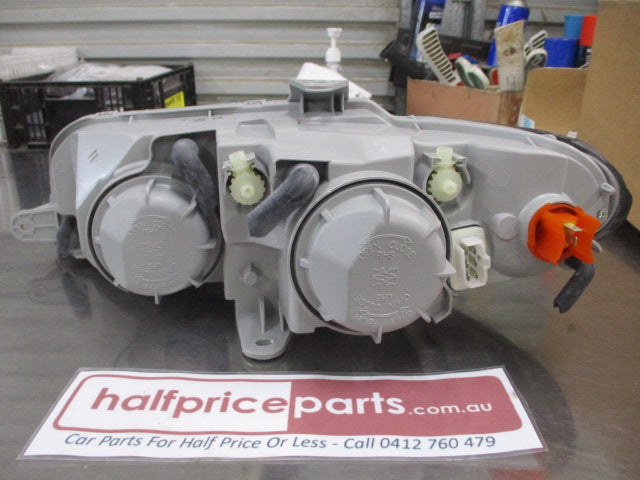 Holden VT Statesman / Caprice Genuine Drivers Side Head Light Assembly New Part.