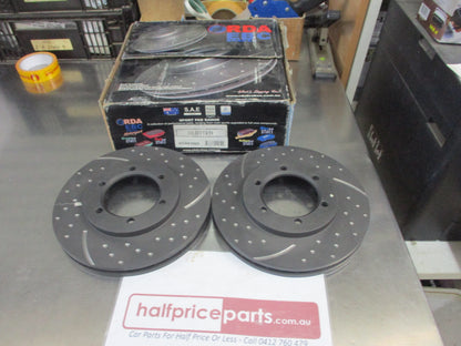 RDA Front Disc Brake Rotors (Pair) Slotted-Dimpled Suits Nissan Navara D22 New Part