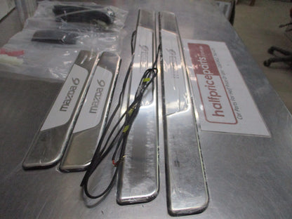 Mazda 6 Genuine Illumination Scuff Plate Set (Front And Rear) New Part