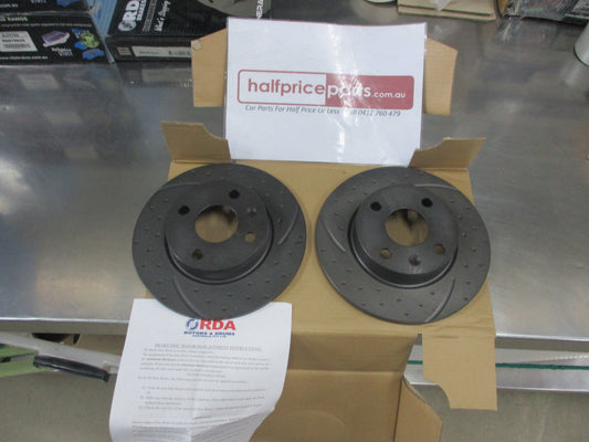 RDA Rear Disc Brake Rotors (Pair) Slotted-Dimpled Suits Holden Barina/Tigra New Part