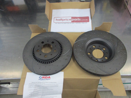 RDA Front Disc Rotors Slotted/Dimpled Suits Volvo XC70/S60/S80/V70/XC70 (Sold As Pairs Only)New Part