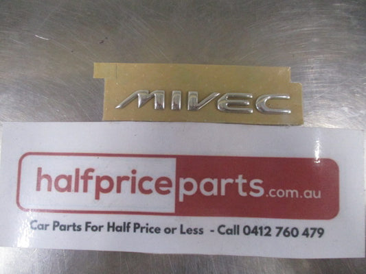 Mitsubishi MIVEC Genuine Rear Chrome Badge New Part
