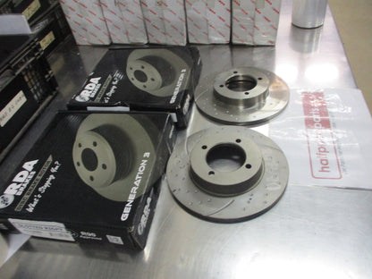 RDA Front Disc Brake Rotors (Pair) Slotted-Dimpled Suits Datsun Stanza New Part