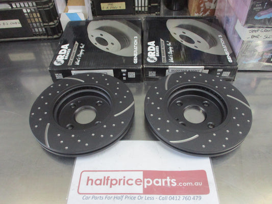 RDA Front Disc Brake Rotors (Pair) Slotted-Dimpled Suits Mazda 2/Fiat Abarth/Ford Fiesta New Part