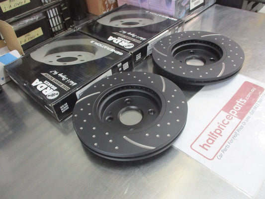 RDA Front Disc Brake Rotors (Pair) Slotted-Dimpled Suits Mazda 2/Fiat Abarth/Ford Fiesta New Part