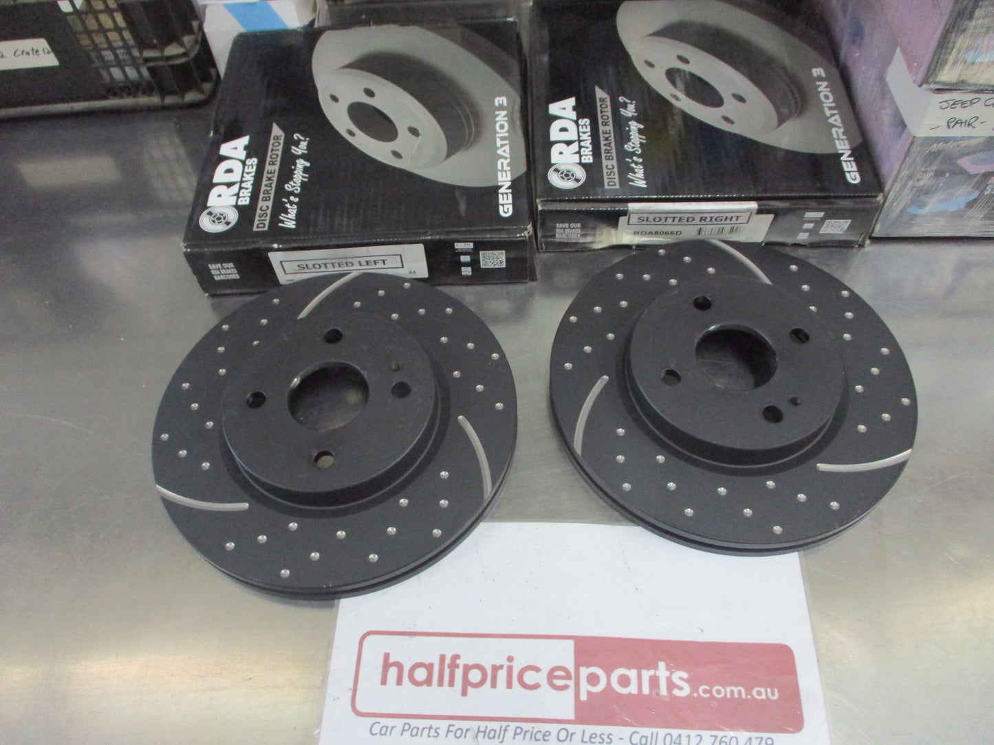 RDA Front Disc Brake Rotors (Pair) Slotted-Dimpled Suits Mazda 2/Fiat Abarth/Ford Fiesta New Part