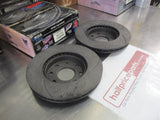RDA Front Disc Brake Rotors (Pair) Slotted-Dimpled Suits Holden Barina TK New Part