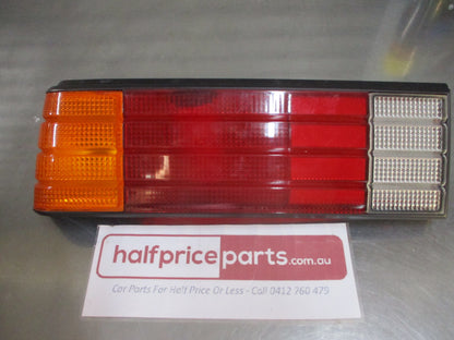 Holden JB/JD Camira Sedan Genuine Left Hand Rear Tail Light Lens New Part