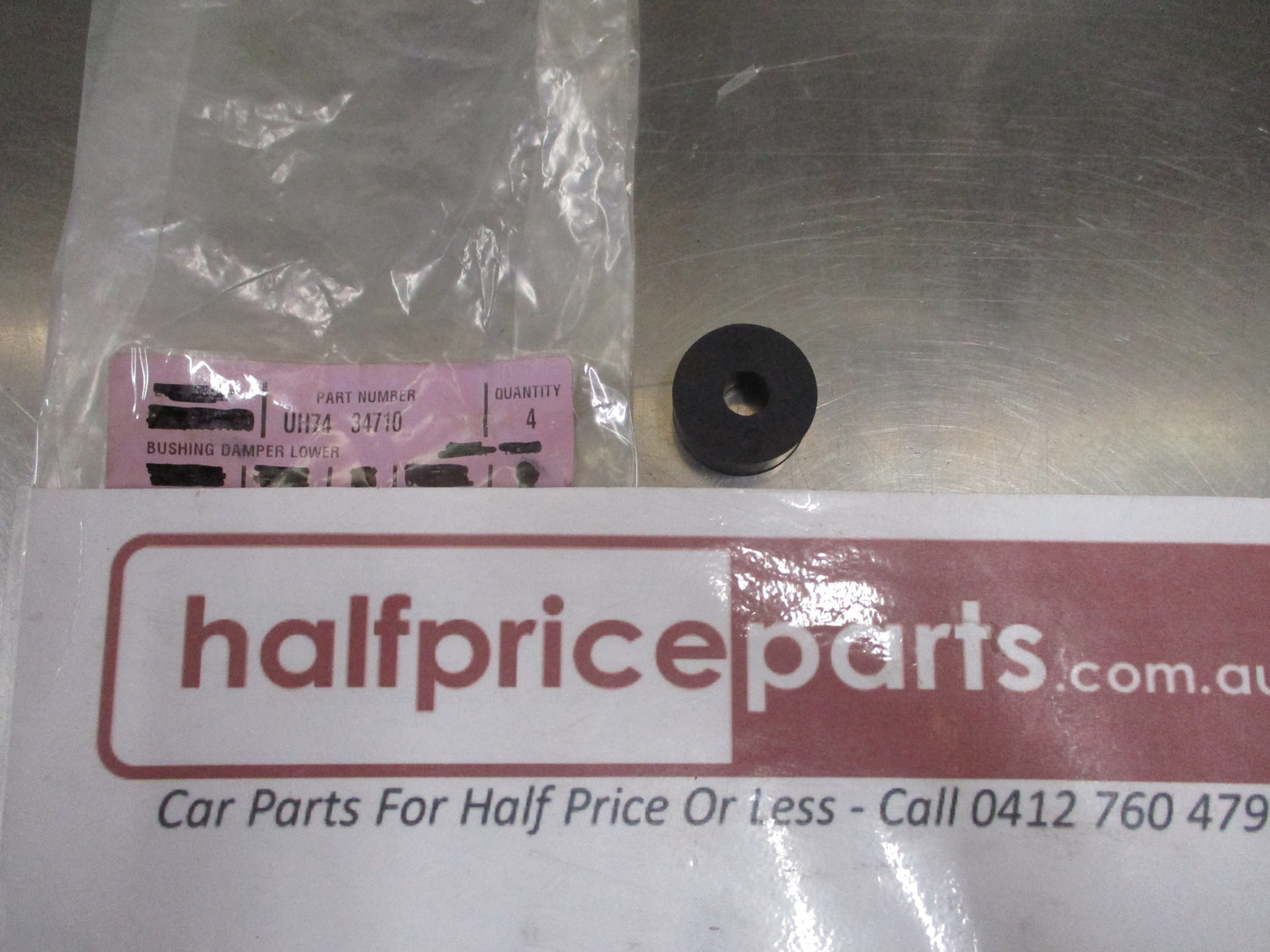 Mazda B2500-B2200 Genuine Lower Damper Bush New Part