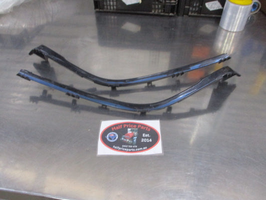 Mazda 3 Genuine Front Left And Right Front Grille Molding Used Part