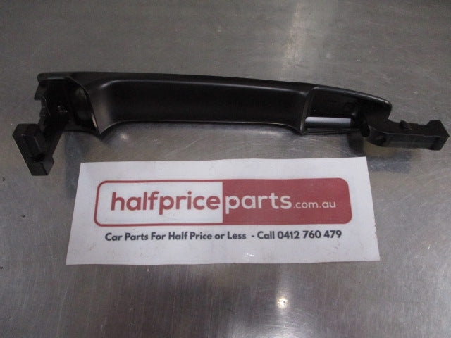 Mitsubishi Lancer Genuine Left Hand Front Outside Handle (Unpainted) New Part.