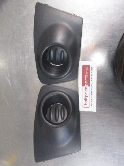 Mitsubishi ML Triton Genuine Fog Light Cover Pair (Black) New Part