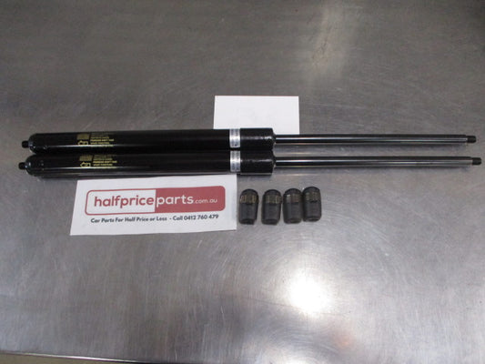 Mitsubishi MQ Triton Genuine Pair Hard Lid Gas Struts New Part