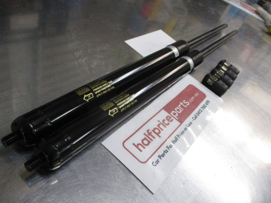 Mitsubishi MQ Triton Genuine Pair Hard Lid Gas Struts New Part