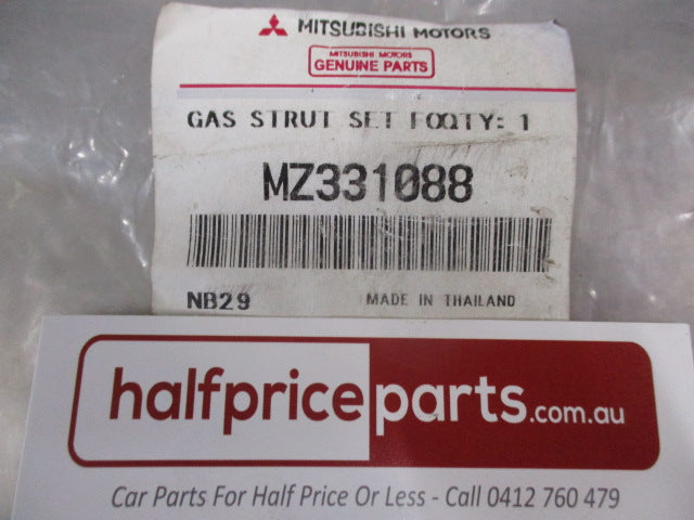 Mitsubishi MQ Triton Genuine Pair Hard Lid Gas Struts New Part