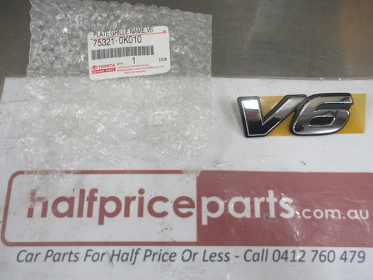 Toyota Hilux Genuine Front Grille Chrome V6 Emblem New Part