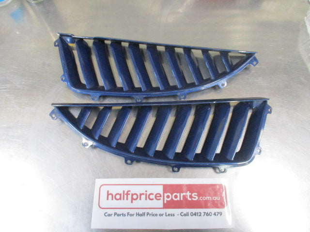 Mitsubishi Magna/Verada Genuine Front Bumper Radiator Grille Pair (Blue) Used Part