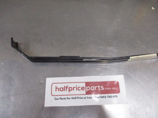 Mitsubishi Lancer/Mirage Genuine Front Lower Bumper Bracket New Part