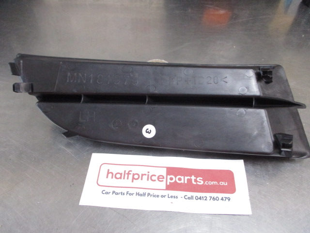 Mitsubishi 380 Genuine Left Hand Front Bumper Garnish New Part