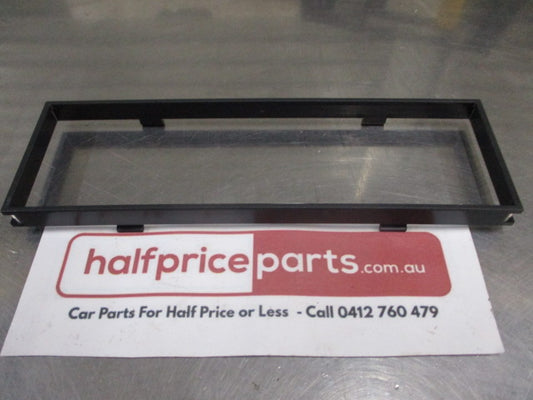Mitsubishi Triton Genuine Centre Compartment Instrument Surround Cover New Part