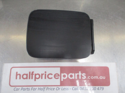 Hyundai Excel Genuine Fuel Filler Door Assembly (Unpainted) New Part