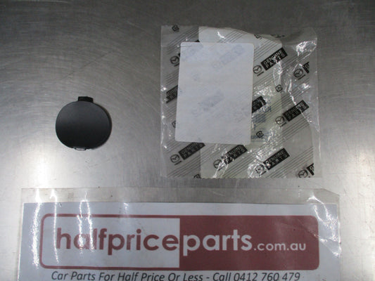Mazda CX-5 Genuine Left Hand Rear Tow Hook Cover (Unpainted) New Part