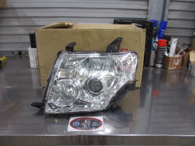 Mitsubishi NT Pajero Exceed Xenon Genuine Left Hand Head Light Used Part
