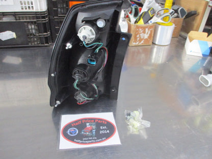 Mitsubishi Pajero Genuine Right Hand Side Combination Tail Light Assembly (Drivers) New Part