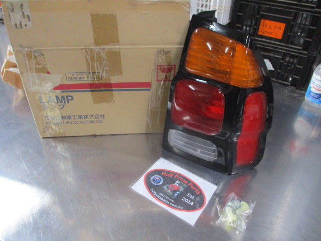 Mitsubishi Pajero Genuine Right Hand Side Combination Tail Light Assembly (Drivers) New Part
