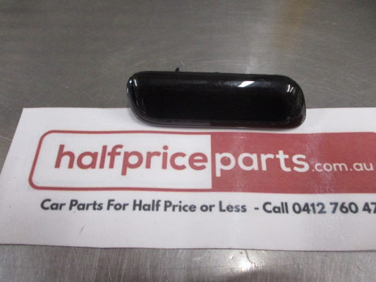 Mitsubishi Pajero Genuine Right Hand Headlight Washer Nozzle Cover (Factory Black) New Part