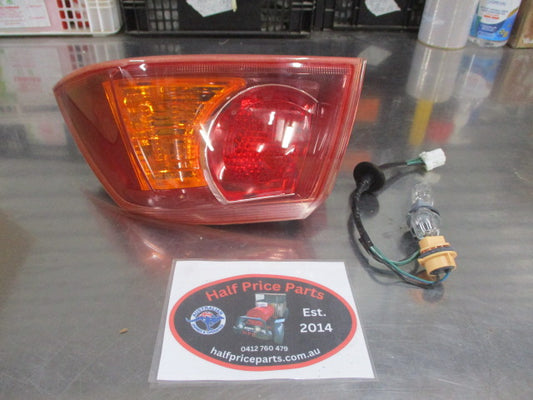Mitsubishi CJ Lancer Genuine Right Hand Tail Light Assembly New Part