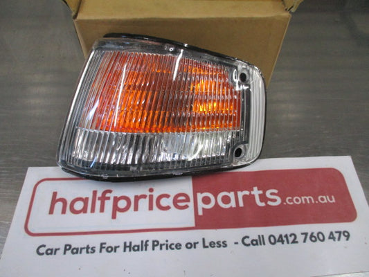 TYC Left Hand Front Corner Indicator & Park Light Suitable For Ford Laser KE New Part