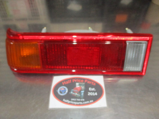 Mitsubishi Colt RC Hatch Genuine Left Hand Tail Light Assembly New Part