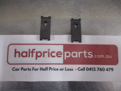 Mitsubishi Lancer Genuine Front Bumper Retainer 2 Pack New Part