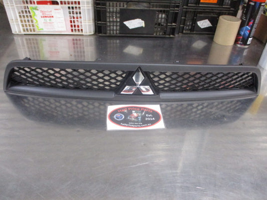 Mitsubishi CJ Lancer Genuine Upper Front Grille Assembly With Emblem New Part