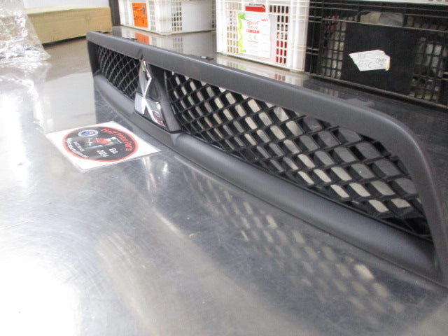 Mitsubishi CJ Lancer Genuine Upper Front Grille Assembly With Emblem New Part