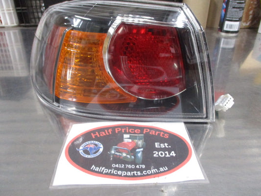 Mitsubishi Lancer CJ Genuine Left Hand Tail Light Assembly New Part