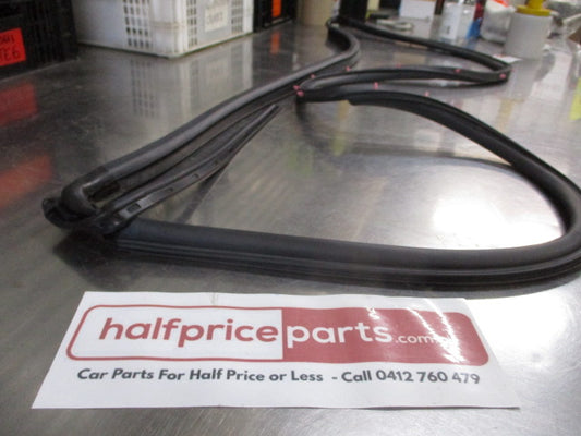 Mitsubishi Lancer Genuine Right Hand Rear Outer Weatherstrip New Part
