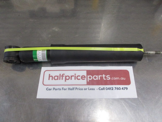 Ford Escape/Mazda Tribute Genuine Left Or Right Hand Rear Shock Absorber New Part
