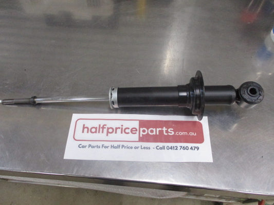 Mitsubishi Lancer Genuine Rear Shock Absorber Fits Left Or Right Hand Side New Part.
