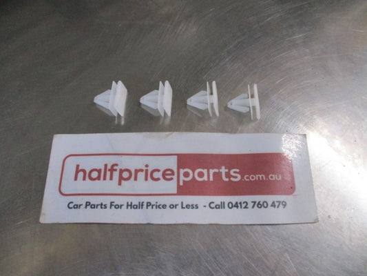 Ford Ranger/F-350/F-250/F-150/Escape Genuine Lower Rocker Molding Clip (Set 4)-  New Part